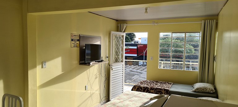 Loft no Centro com ar cond., Netflix e cozinha