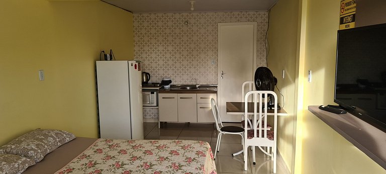Loft no Centro com ar cond., Netflix e cozinha