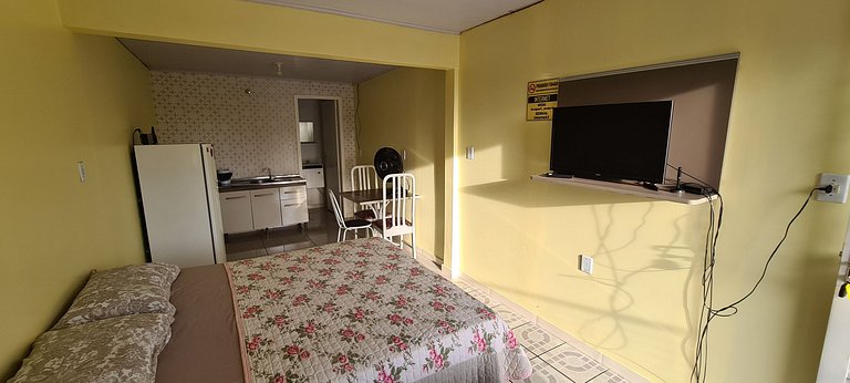 Loft no Centro com ar cond., Netflix e cozinha