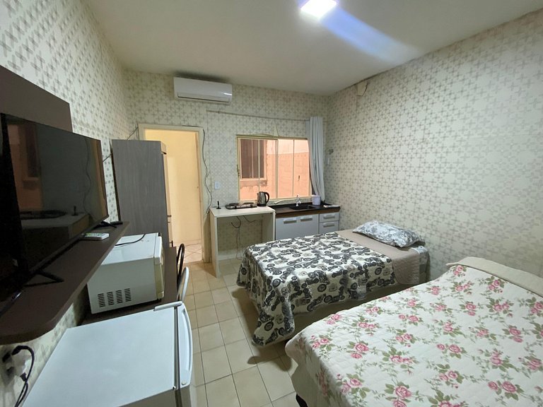 Loft no centro com cozinha compacta, ar cond. e Netflix